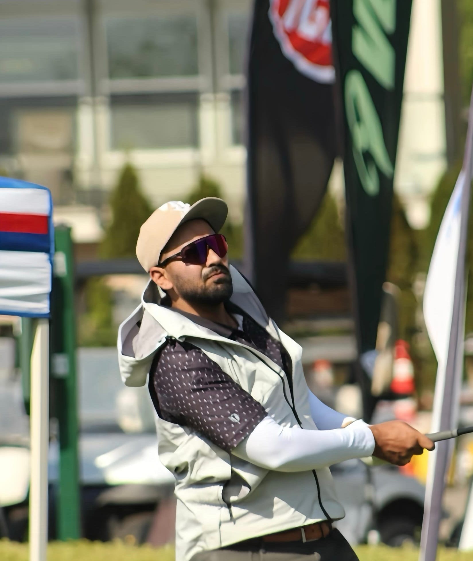 Tarun Chadha watching his shot flight down the fairway