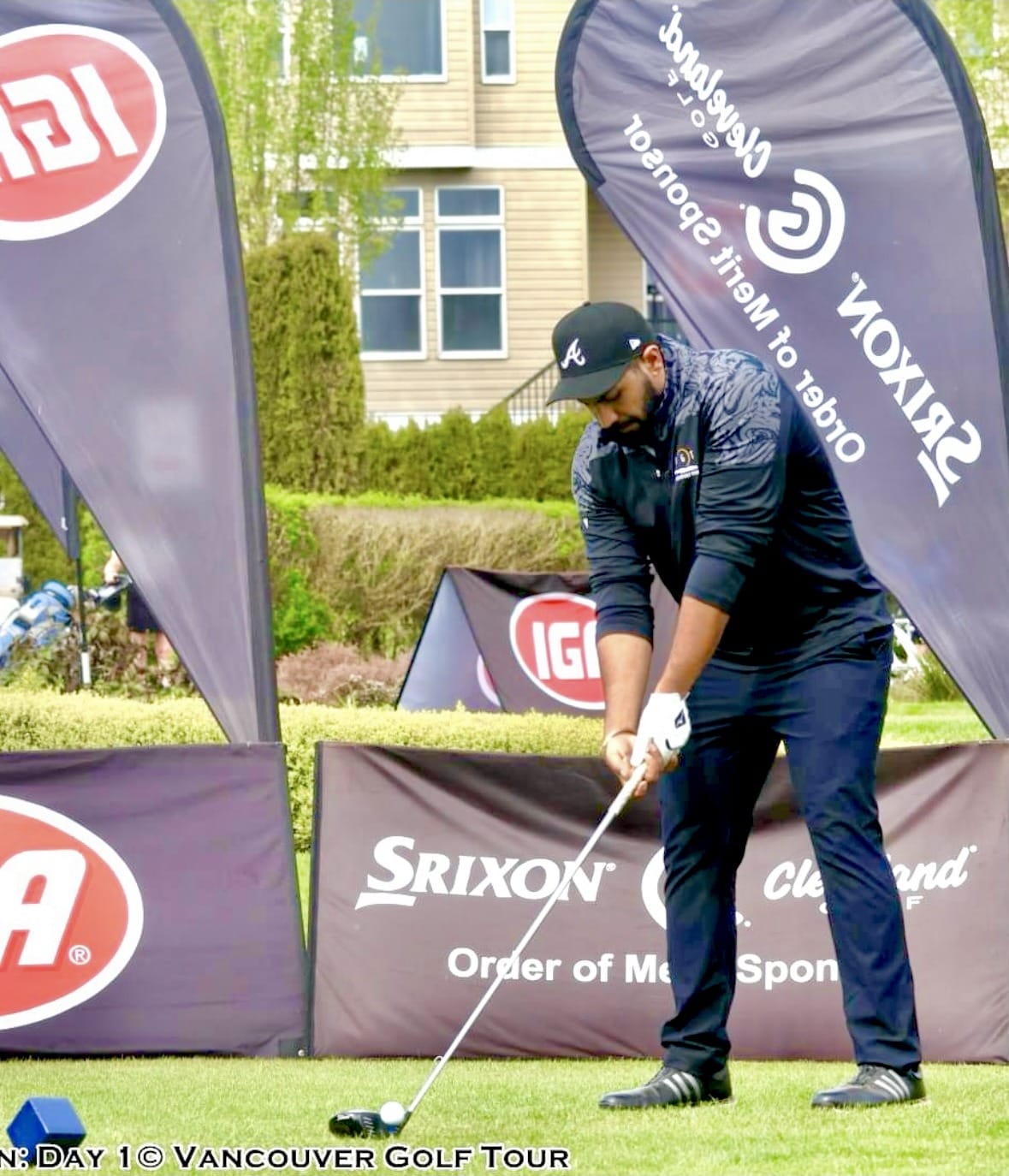 Tarun Chadha watching his shot flight down the fairway